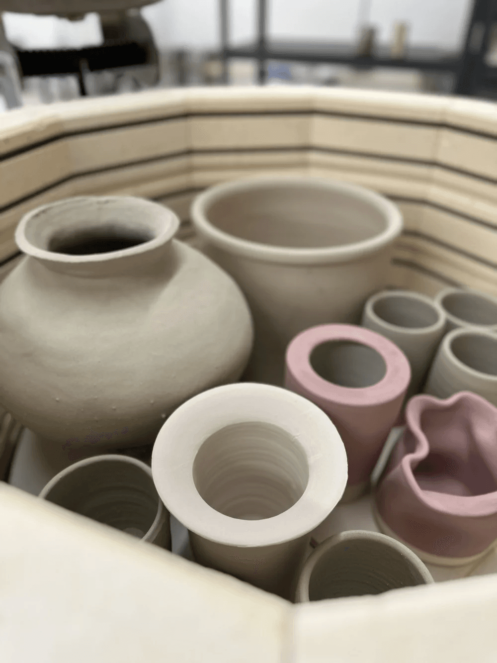 Fresh ceramic work arranged inside a kiln